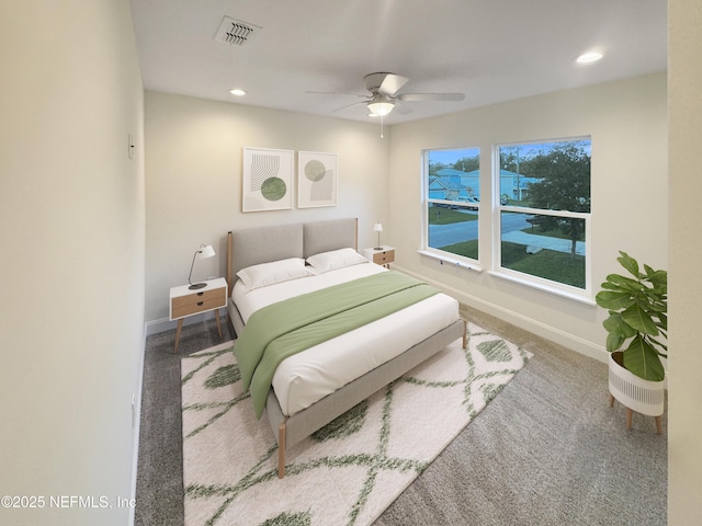 bedroom with ceiling fan and carpet flooring