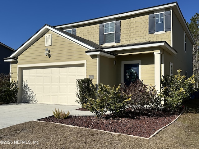 view of front of property with a garage