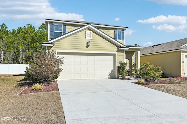 front of property featuring a garage