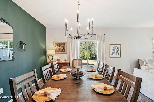 dining space featuring a chandelier