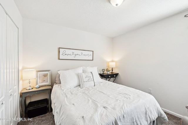 carpeted bedroom featuring a closet