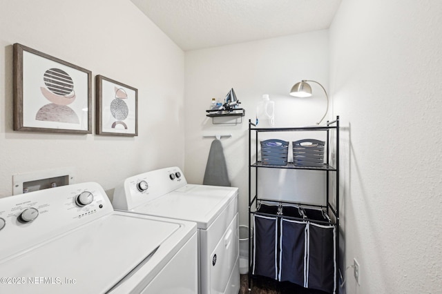 washroom with washing machine and dryer