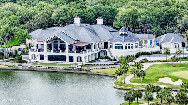 drone / aerial view featuring a water view