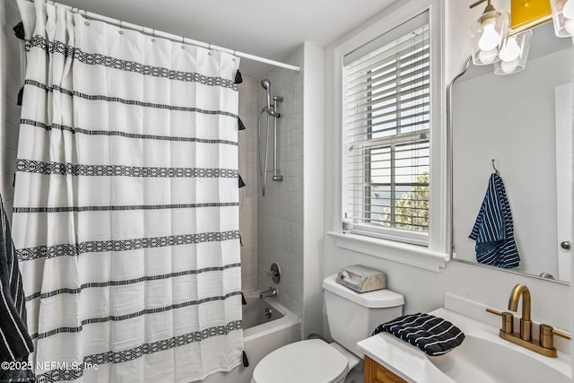 full bathroom with vanity, toilet, and shower / bath combo with shower curtain