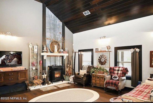 living room featuring lofted ceiling and dark wood-type flooring