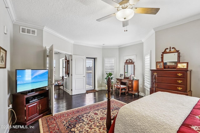 bedroom with multiple windows, crown molding, dark wood-type flooring, and a textured ceiling