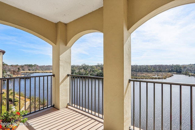 balcony featuring a water view