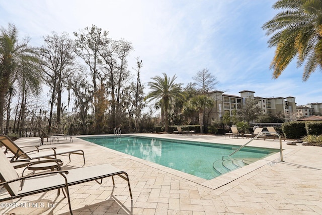 view of pool featuring a patio area