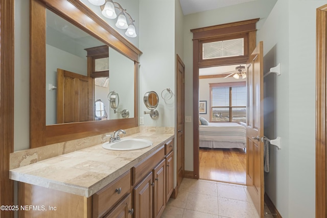 bathroom with vanity, tile patterned floors, and ceiling fan