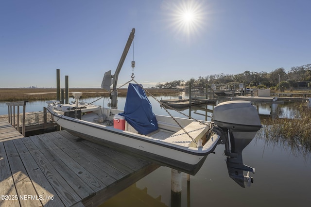 view of dock with a water view