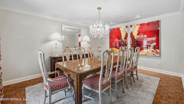 dining room with crown molding, an inviting chandelier, and dark parquet floors