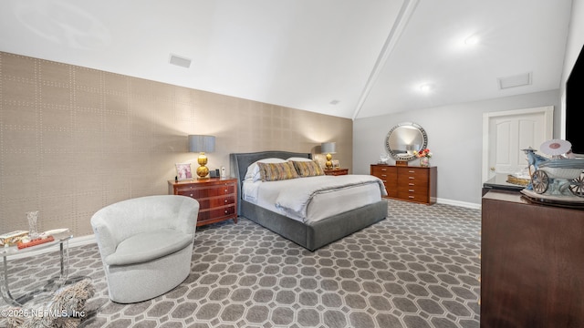 carpeted bedroom featuring lofted ceiling with beams