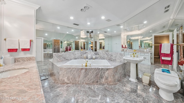 bathroom featuring ornamental molding, toilet, separate shower and tub, and dual sinks