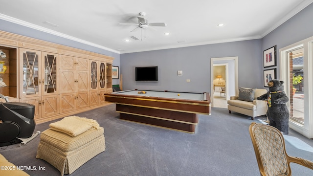 recreation room with dark colored carpet, crown molding, pool table, and ceiling fan