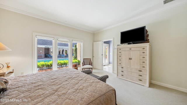 carpeted bedroom with crown molding