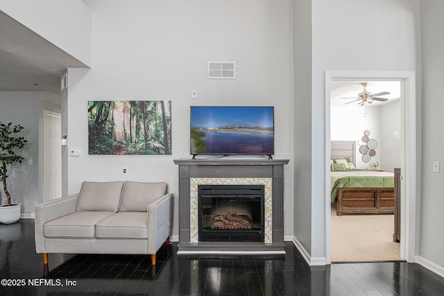 living room with dark hardwood / wood-style floors