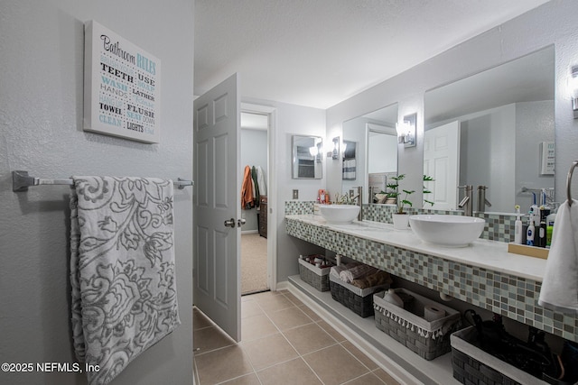 bathroom featuring tile patterned floors and vanity