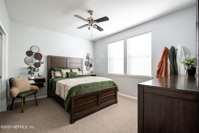 bedroom with light colored carpet and ceiling fan