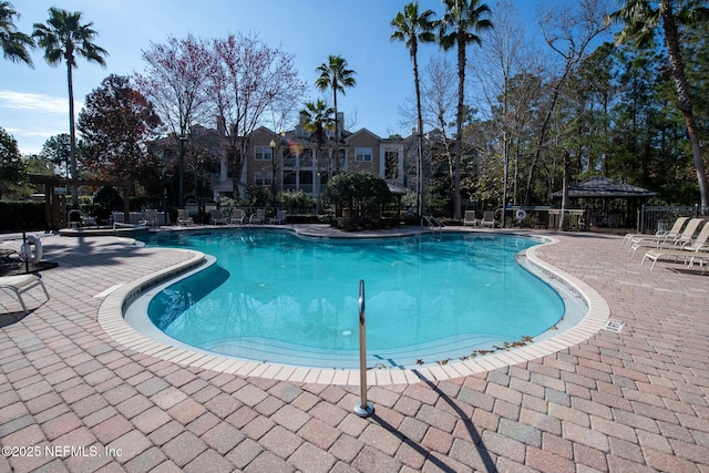 view of pool with a gazebo and a patio