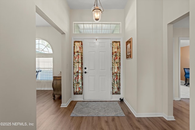 entrance foyer with light hardwood / wood-style floors