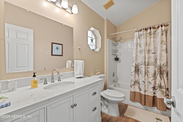 full bathroom featuring toilet, wood-type flooring, vaulted ceiling, vanity, and shower / bath combination with curtain