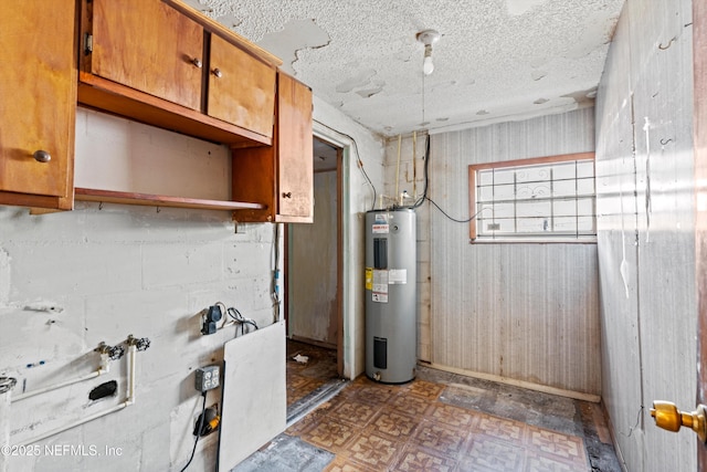 utility room featuring electric water heater