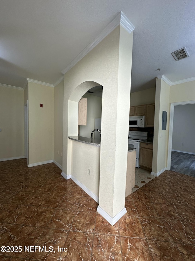 interior space featuring crown molding and dark tile patterned flooring