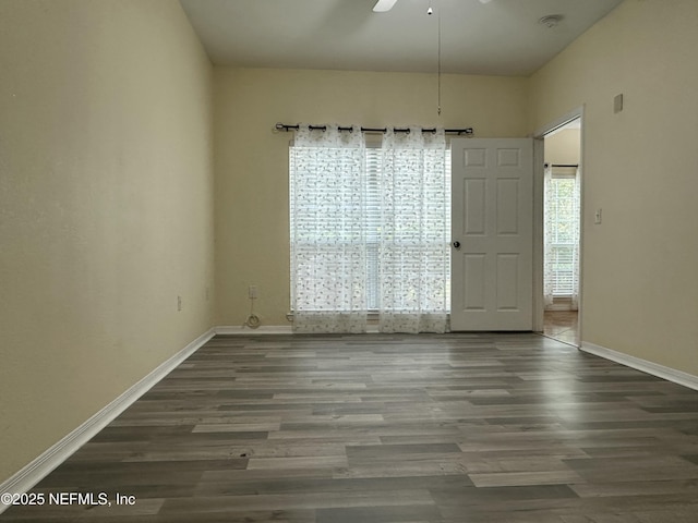 unfurnished dining area with hardwood / wood-style floors and ceiling fan