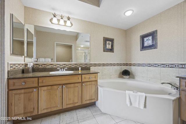 bathroom featuring vanity, tile patterned floors, and independent shower and bath