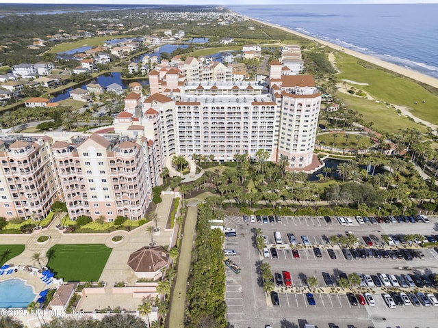 bird's eye view with a view of the beach and a water view