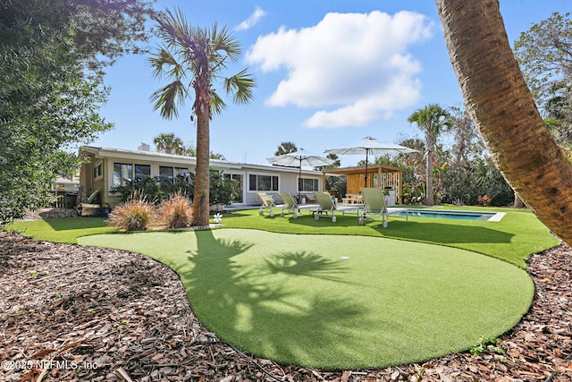 view of property's community featuring a pool