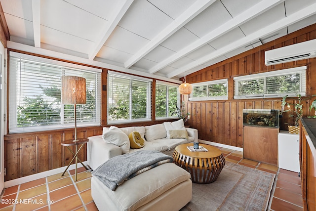 sunroom / solarium featuring lofted ceiling with beams and a wall unit AC