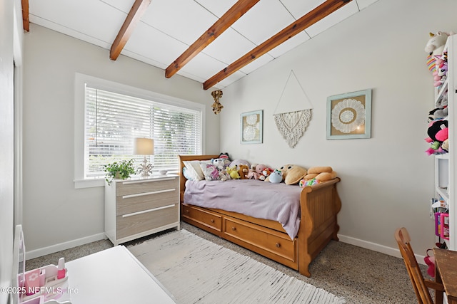 bedroom with lofted ceiling with beams