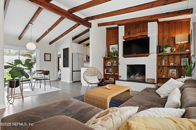 living room featuring beamed ceiling, high vaulted ceiling, and a brick fireplace