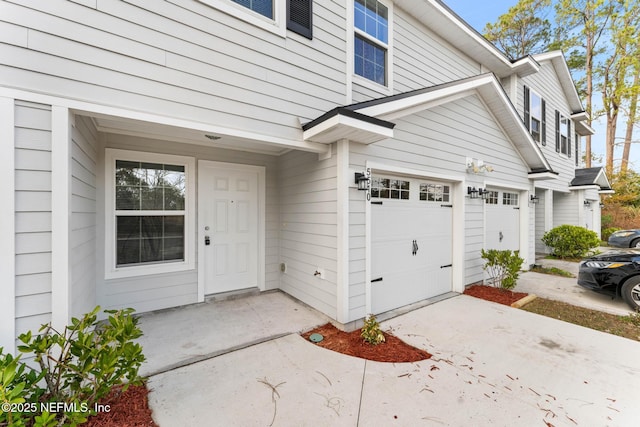 property entrance featuring a garage