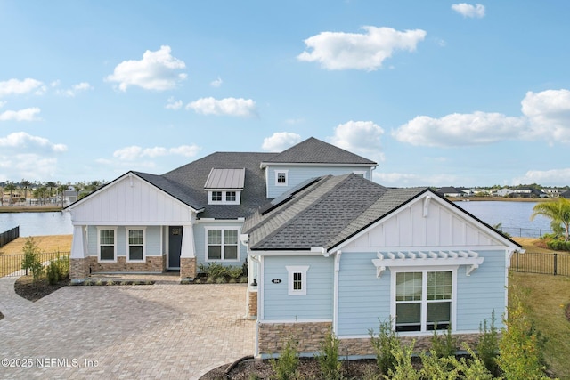 view of front of property with solar panels