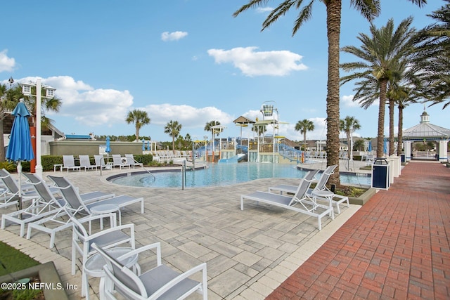 view of pool featuring a gazebo and a patio