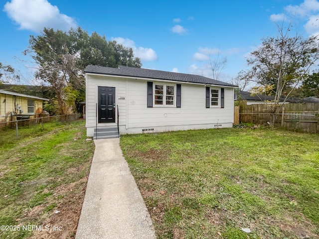 view of front of home with a front lawn