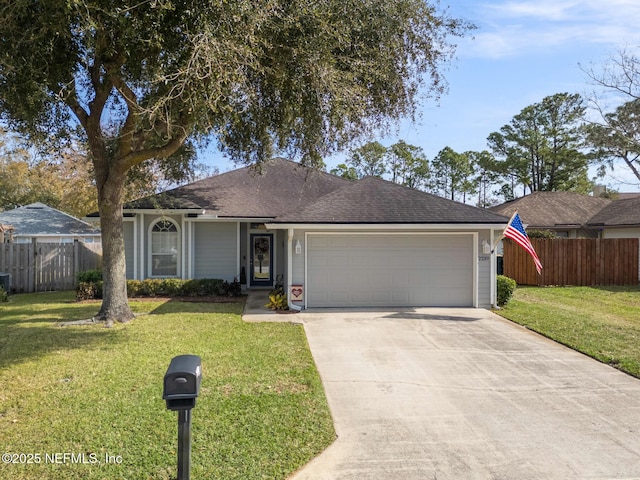 ranch-style house with a garage and a front lawn