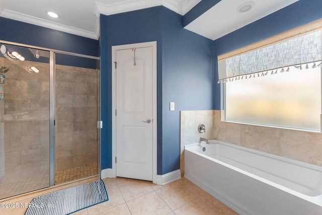 bathroom with tile patterned flooring, crown molding, and plus walk in shower