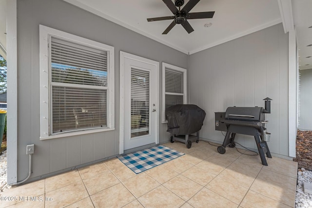 exterior space featuring ceiling fan and a patio area