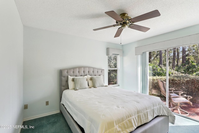 bedroom with ceiling fan, carpet, access to outside, and a textured ceiling