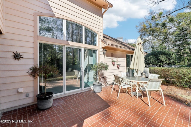 view of patio with outdoor dining area