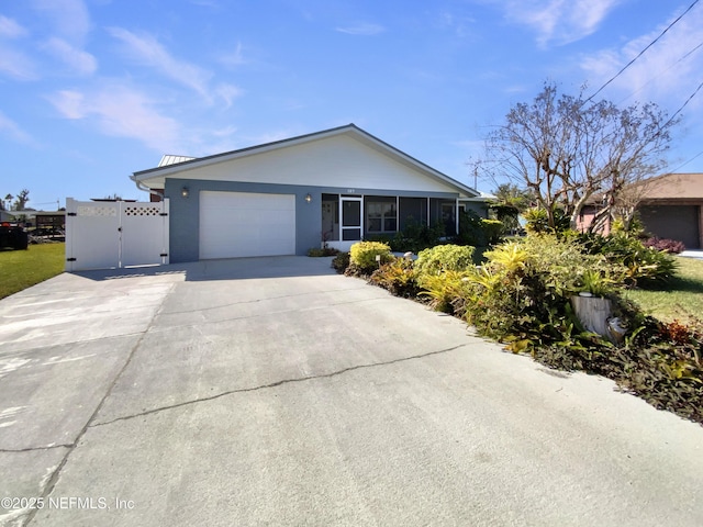 ranch-style home with a garage