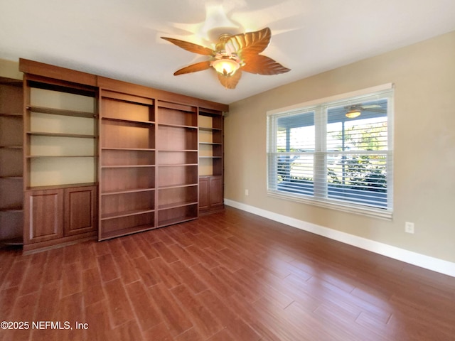 interior space with wood-type flooring and ceiling fan