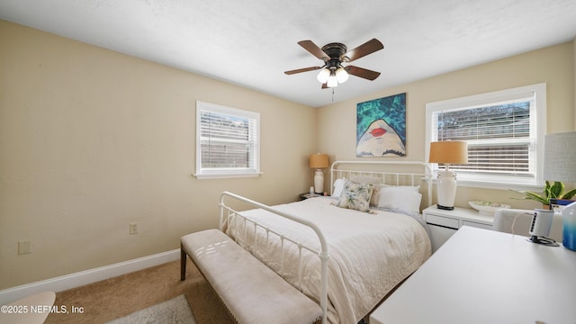 bedroom featuring ceiling fan and carpet flooring