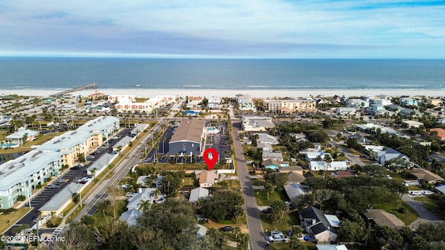 aerial view featuring a water view and a view of the beach