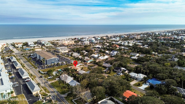 bird's eye view with a water view and a view of the beach