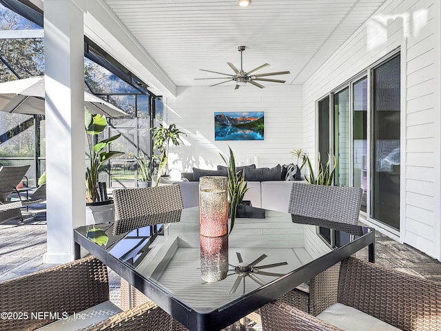 view of patio with ceiling fan and an outdoor hangout area