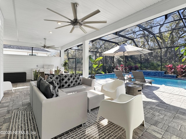 view of patio featuring pool water feature, a lanai, an outdoor hangout area, ceiling fan, and a fenced in pool